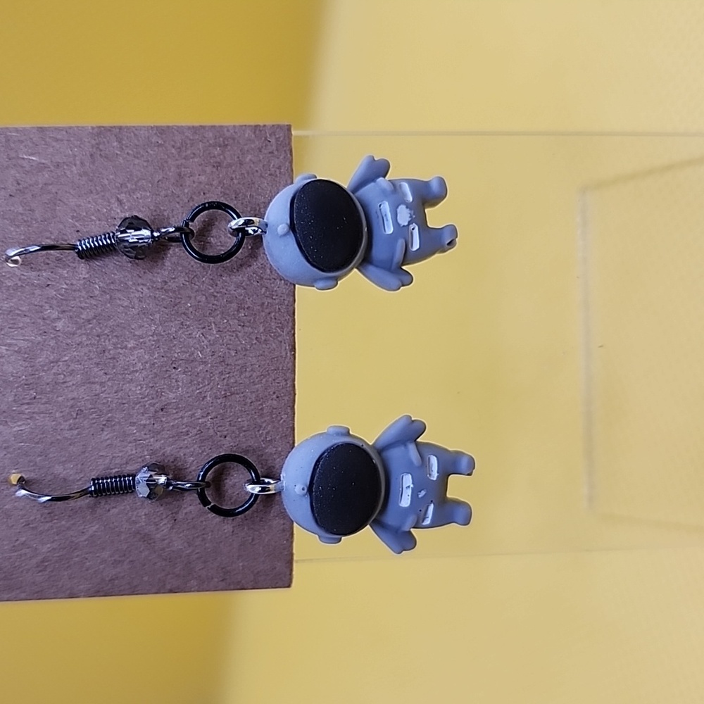 Gray suit astronaut earrings